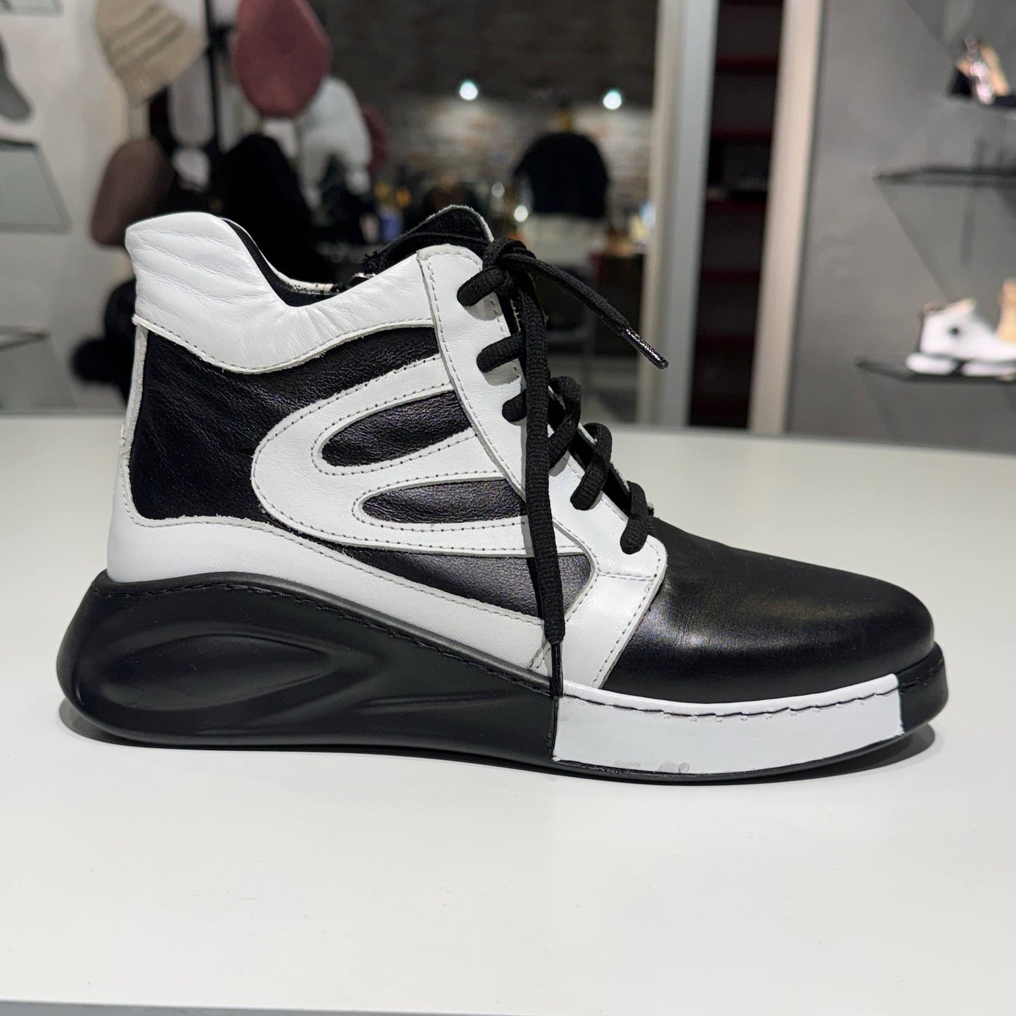 High-Top Lace-Up Sneaker Boot in Black and White