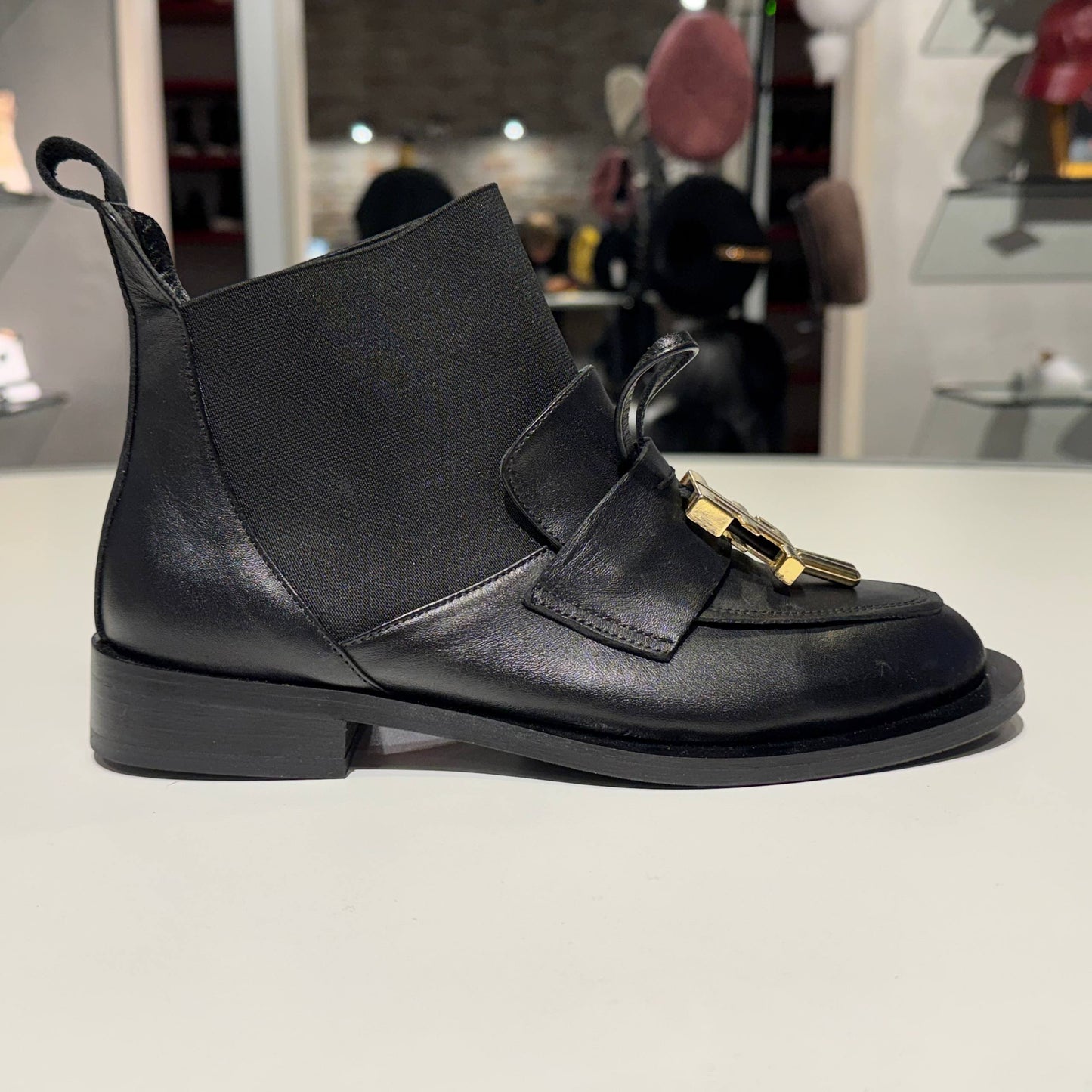 Black Leather Ankle Boot with Gold Hardware Detail
